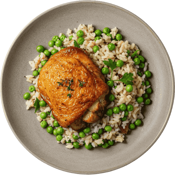 Roasted chicken thigh with rice and peas