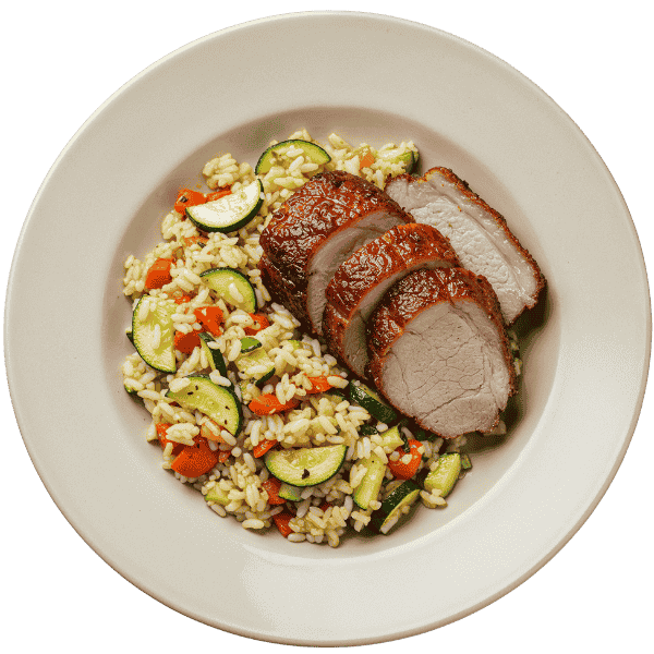 Roast pork meat with rice and vegetables
